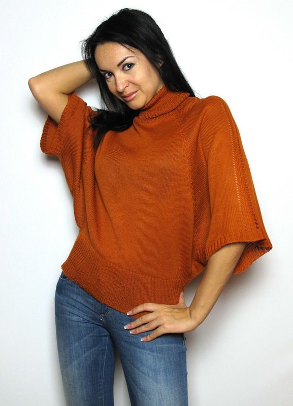 Fille en pull à manches chauve-souris Fille en pull à manches chauve-souris